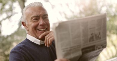 man reading newspaper